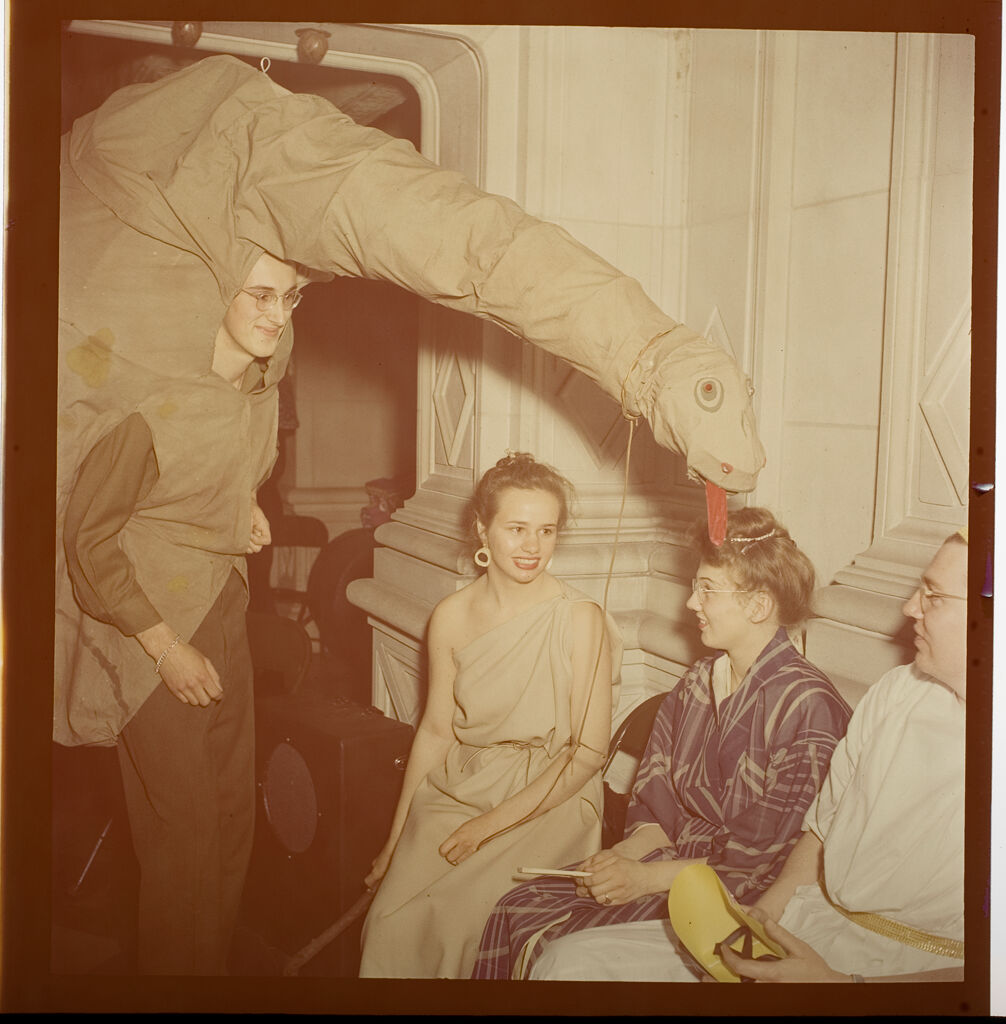 Untitled (People In Costume At Beaux Arts Ball, Man In Dinosaur Suit)