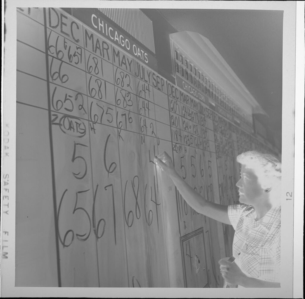 Untitled (Woman Writing Numbers On Blackboard)