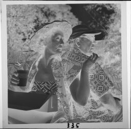 Untitled (Woman And Man Wearing Tropical Outfits)
