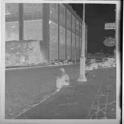 Untitled (Person Sitting On Curb, New York City)