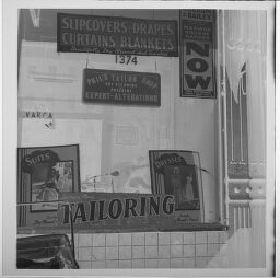 Untitled (Shop Window With Signs)
