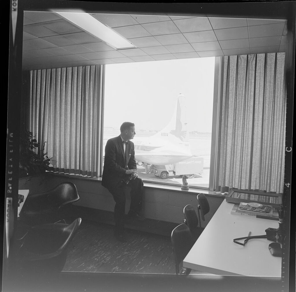 Untitled (Man Sitting At Window In Office)