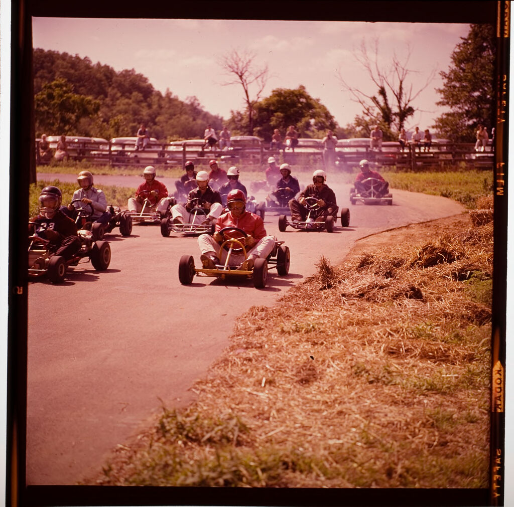 Untitled (Drivers Drag-Racing In Tiny Cars)