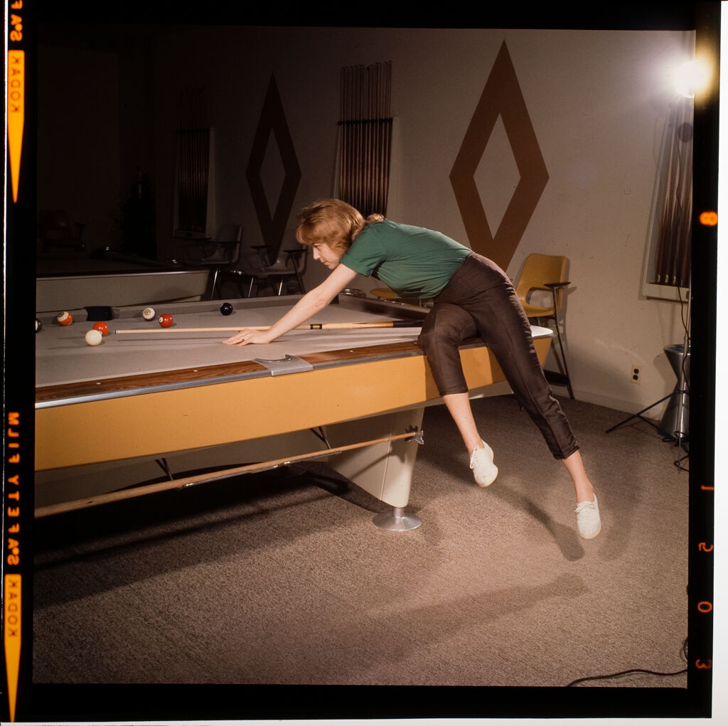 Untitled (Woman And Child Playing Pool)