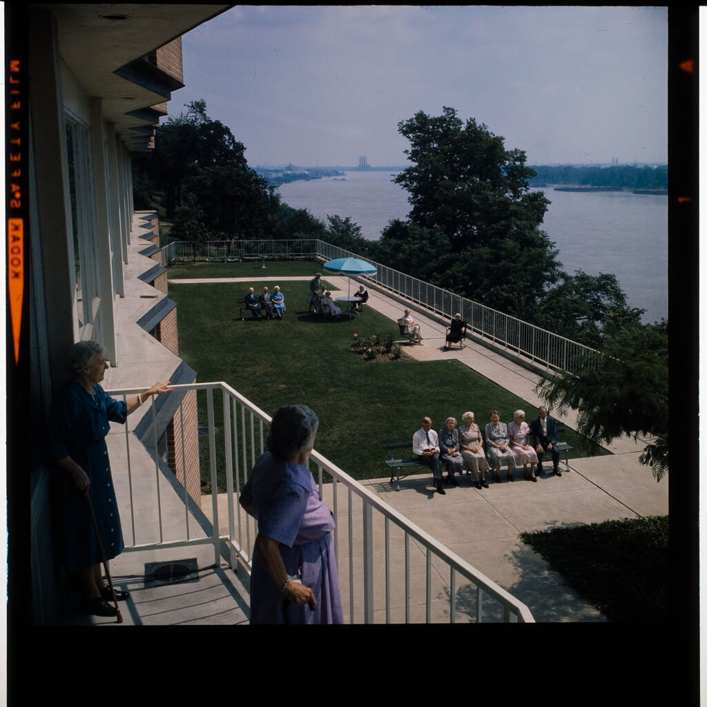 Untitled (Woman Looking At View Of River From Balcony Of Retirement Home)
