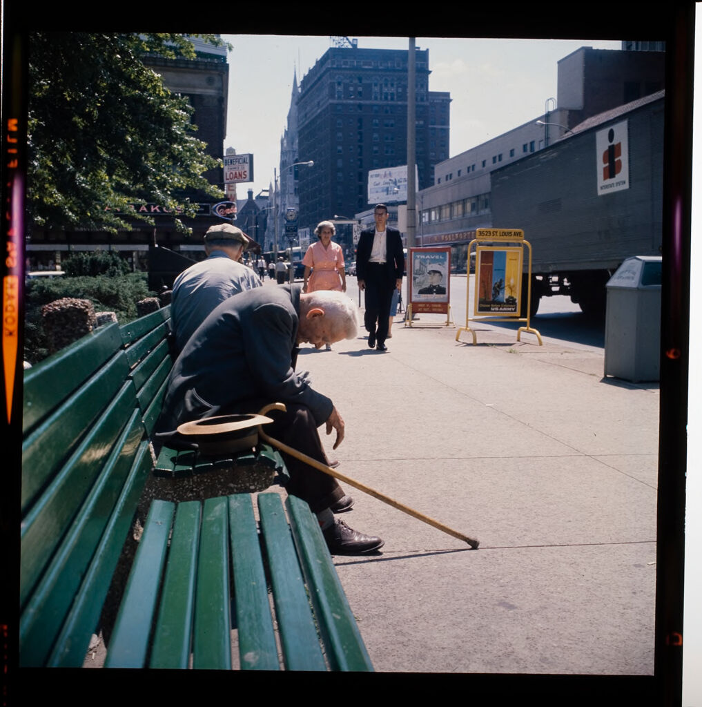 Untitled (Elderly Man Sitting On City Bench, Head Down)