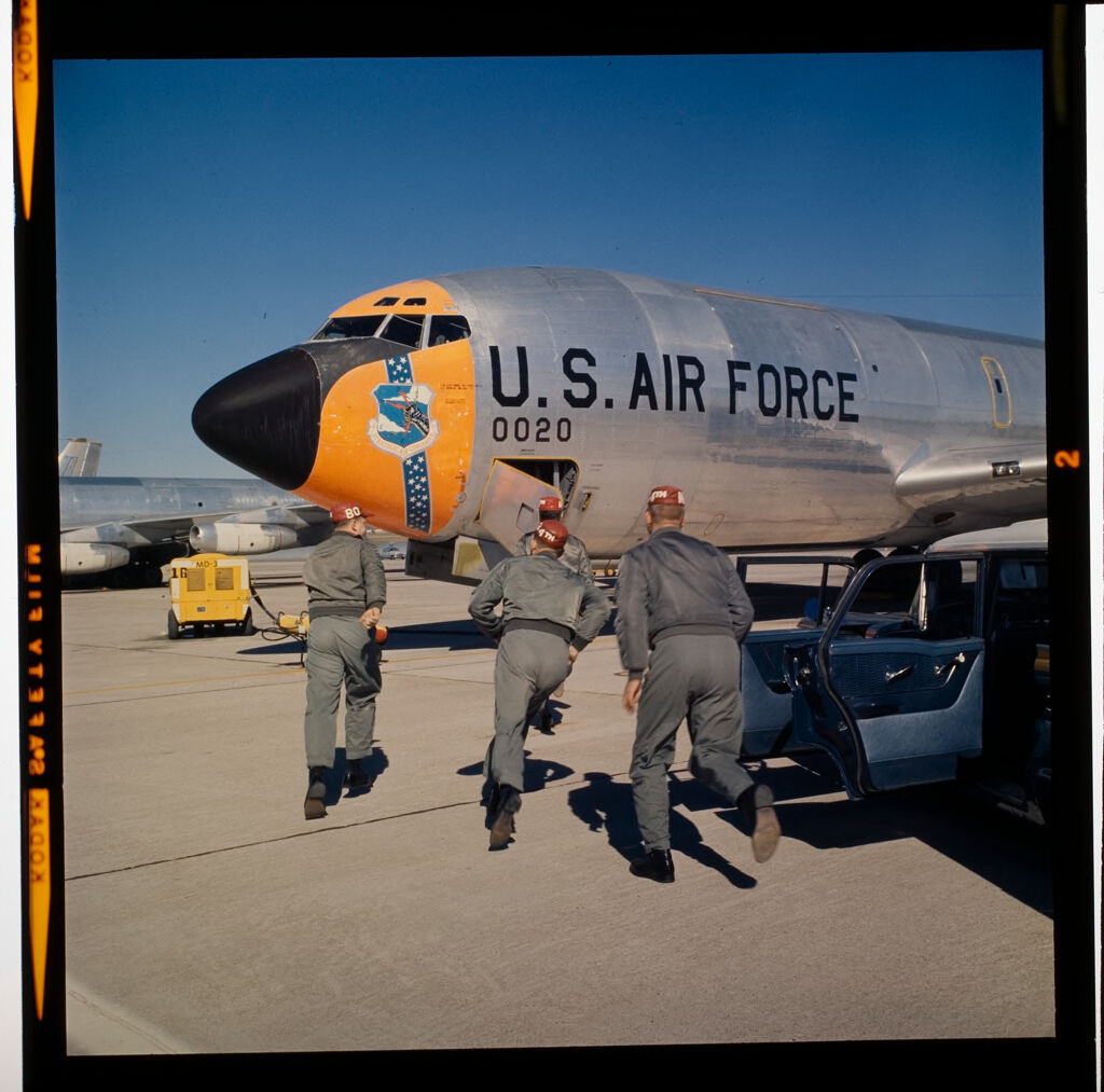 Untitled (Men Next To Large Air Force Jet)