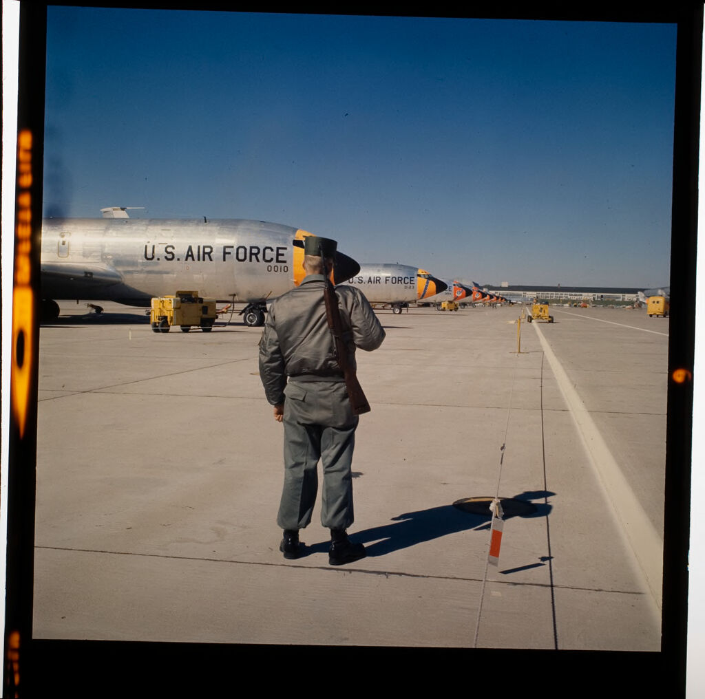 Untitled (Man On Runway Near Large Air Force Jet)