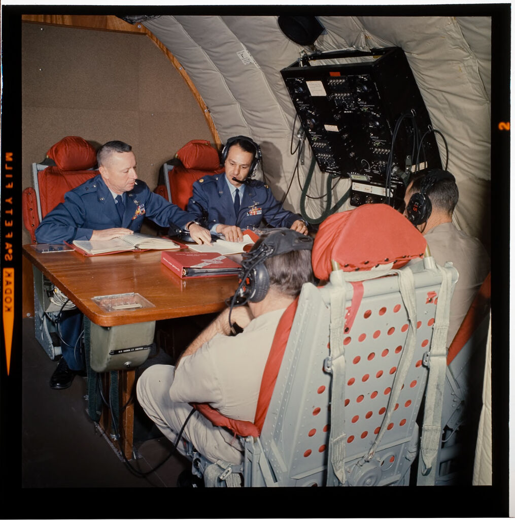 Untitled (Men At Air Force Control Table)