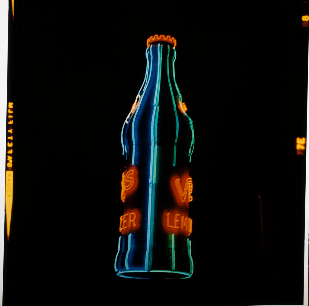 Untitled (Neon Lights At Night, Image Of A Bottle)