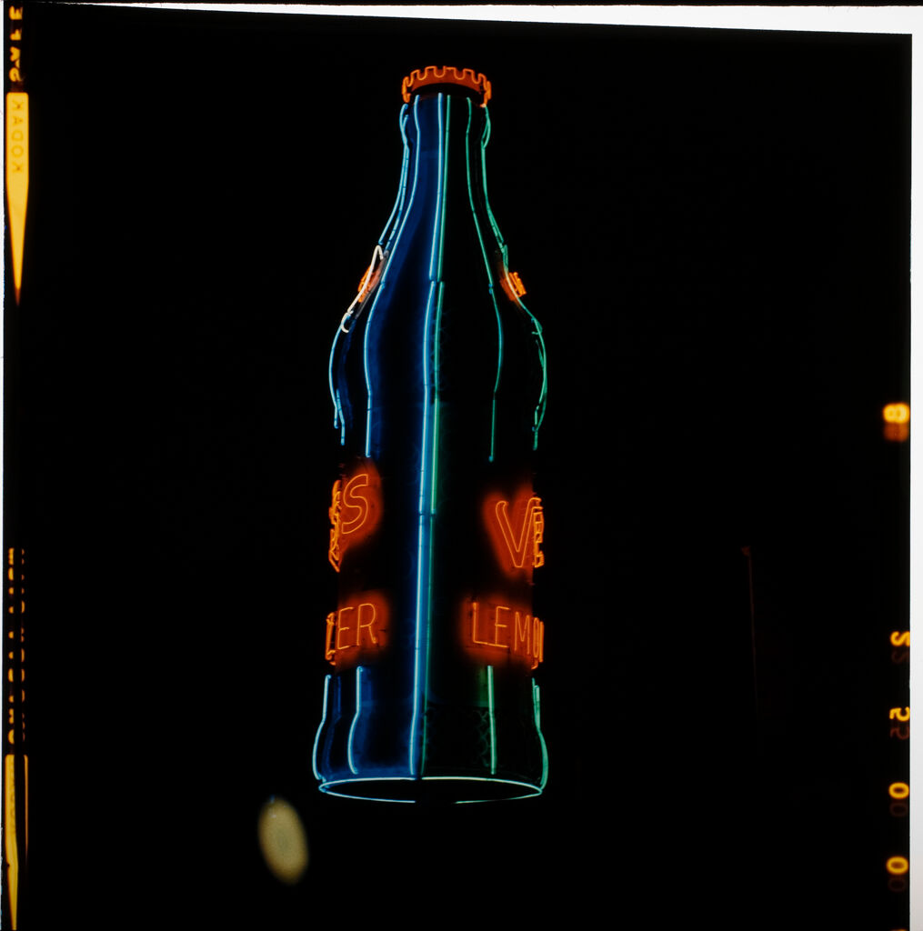 Untitled (Neon Lights At Night, Image Of A Bottle)