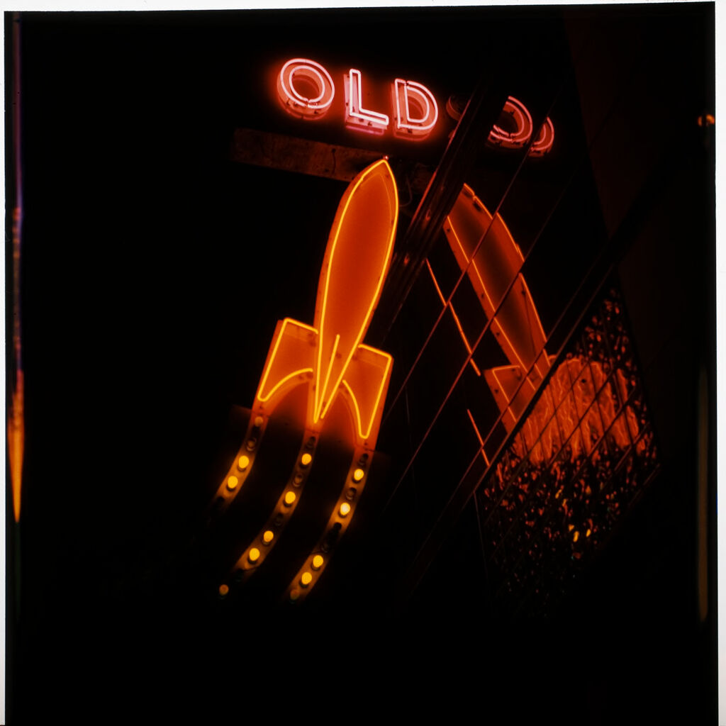 Untitled (Neon Lights At Night; A Rocket)