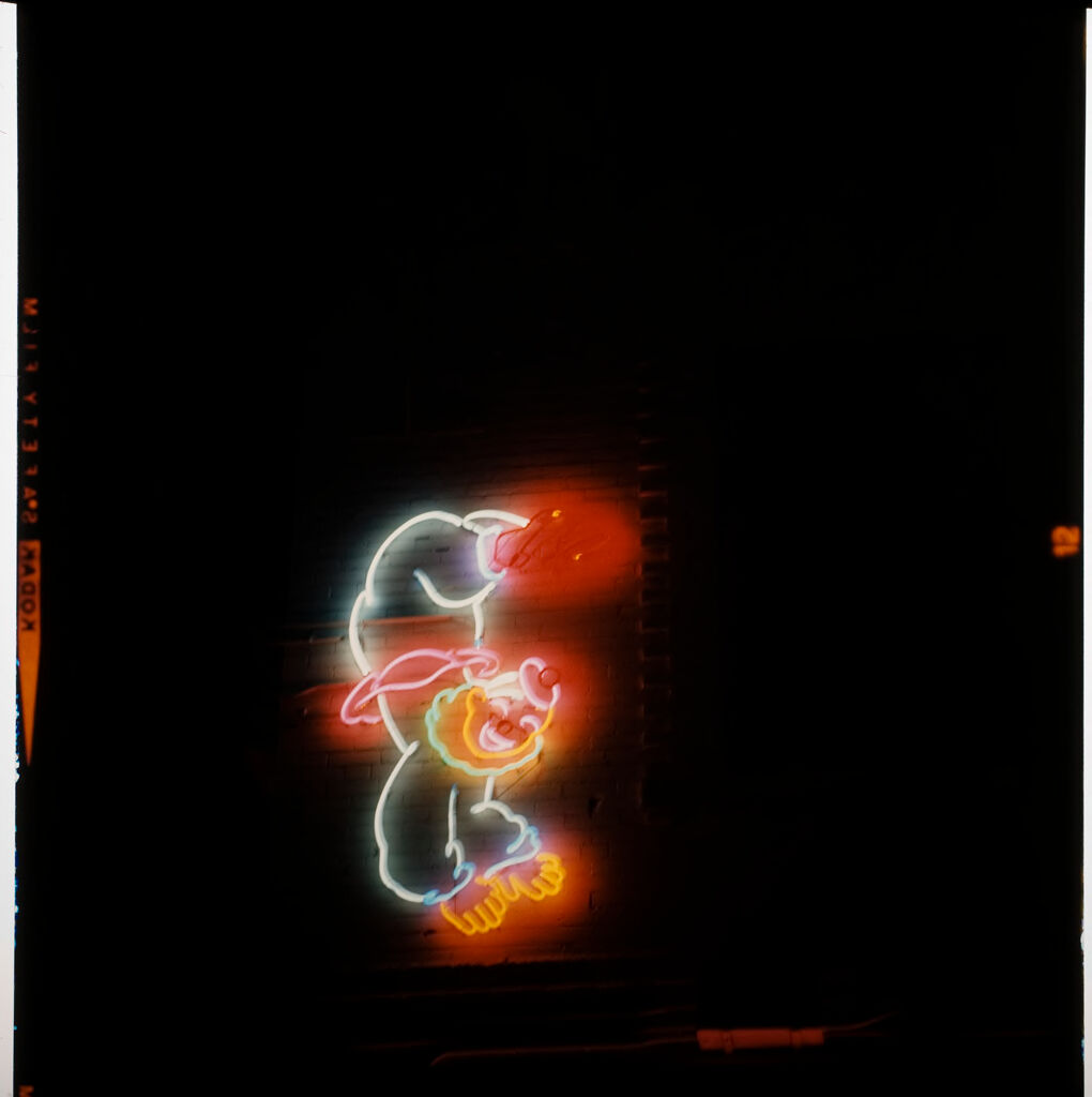 Untitled (Neon Lights At Night; A Clown)