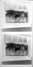 Untitled (Clothing Store Window Displaying Hunting Wares)