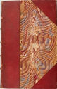 
A bound book cover made of red leather with marbled decoration. 