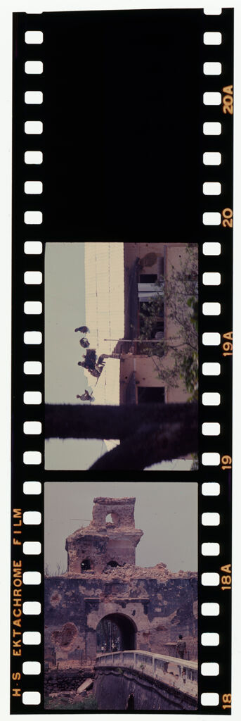 Untitled (Damaged City Gate; Building With Men On Roof, Hue, Vietnam)