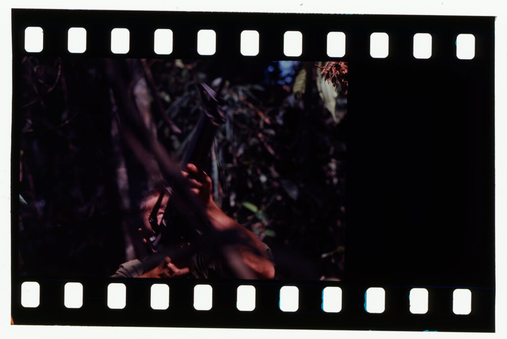 Untitled (Soldier Aiming Gun Into Trees During Fighting In Central Highlands Near Dak To, Vietnam; [Blank])