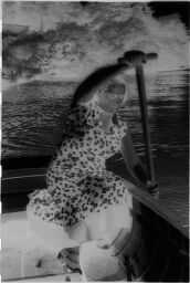 [Julia Feininger Paddling A Rowboat On The Rega River, Baltic Coast]