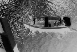 [Julia And Andreas Feininger Paddling A Rowboat On The Rega River, Baltic Coast]