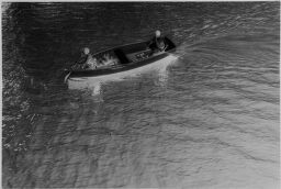 [Julia And Andreas Feininger Paddling A Rowboat On The Rega River, Baltic Coast]