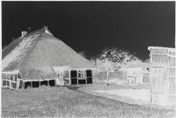 [Thatched Roof House]