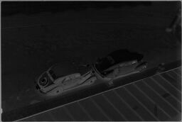 [View From Above Of Cars Parked On Street]