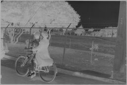 [Woman And Child On Bicycle]