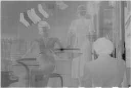 [Shop Window With Woman Looking In, Plymouth, Massachusetts?]