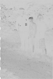 [Unidentified Man,Woman And Boy]