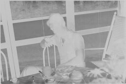 [Unidentified Man On Screened Porch]