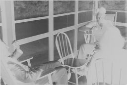 [Unidentified Group Of People On Screened Porch]