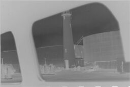 [View Out Window Of Lighthouse And Storage Tank]