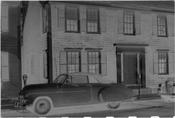 [Front Door Of House With Car]