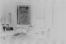 [View Of Julia Feininger Sitting In Chair In Room]