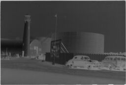 [Lighthouse And Gas Tank]