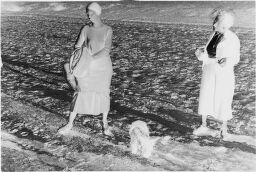 [Two Women And Dog In Field]