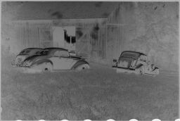 [Cars In Front Of Barn]