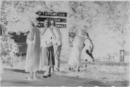 [Sign And Unknown Group Of People, Near Falls Village, Connecticut]