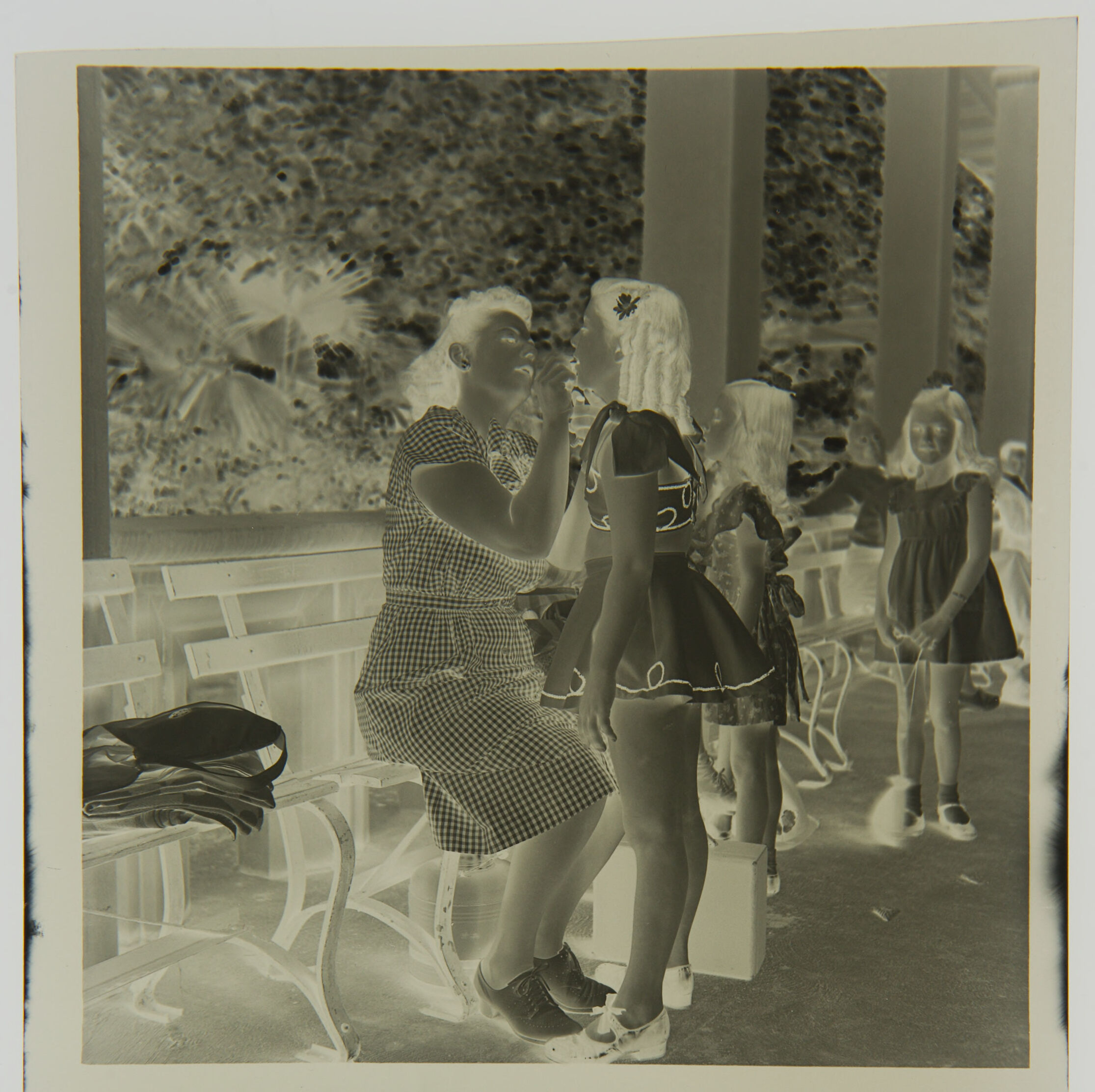 Untitled (Mother Putting Make-Up On Daughter In Swimsuit)