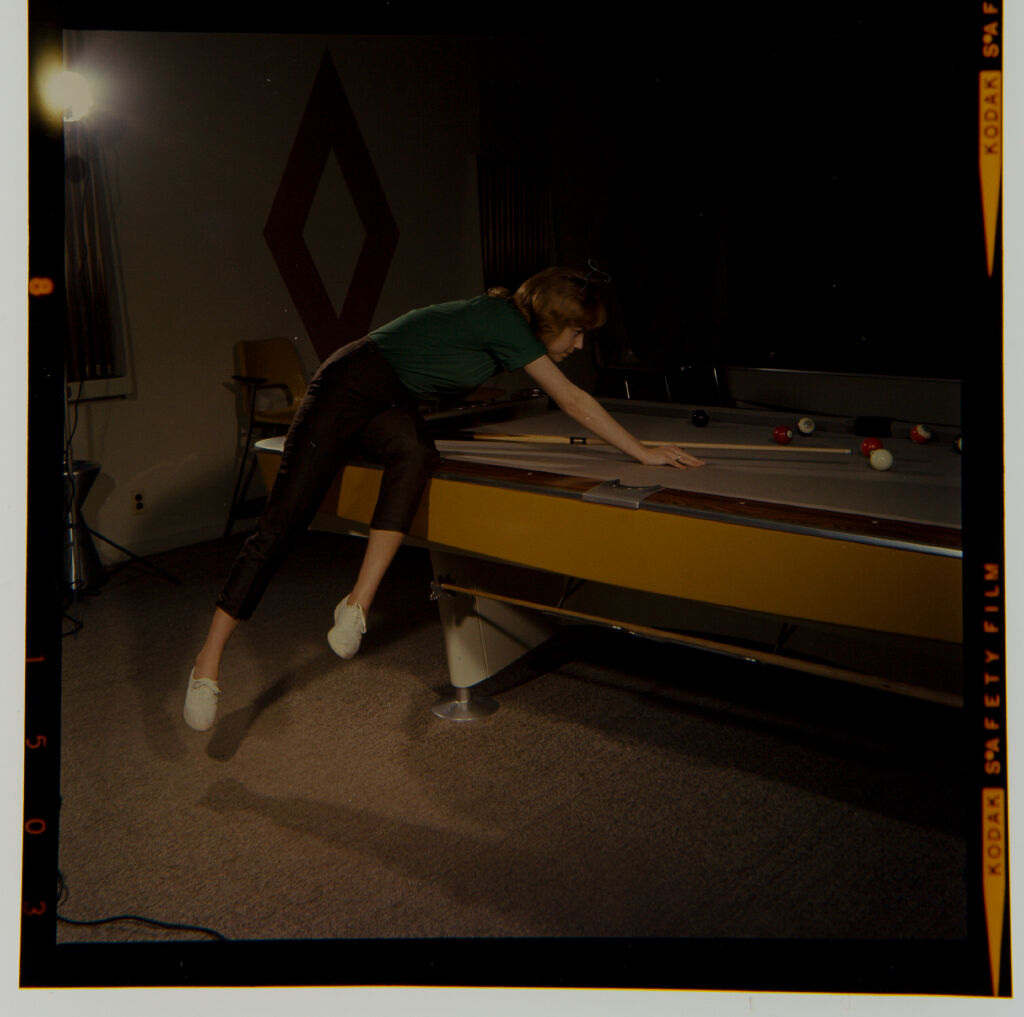 Untitled (Woman Or Child Playing Pool)