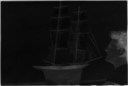 [Young Man With Ship Model]