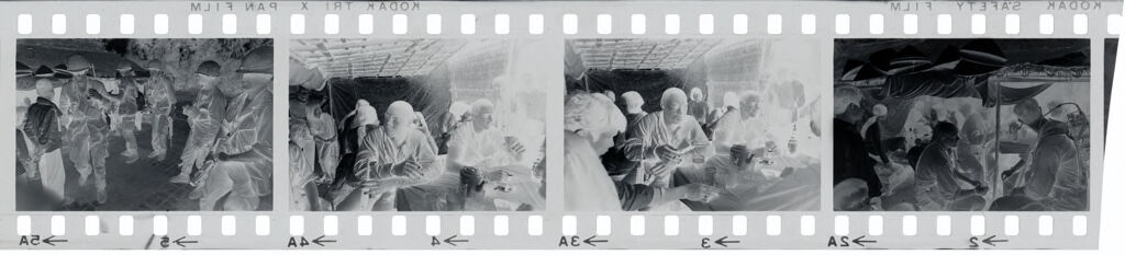 Untitled (Soldiers Taking Break In Dining Tent; Soldiers Standing Outside In Combat Gear, Vietnam)