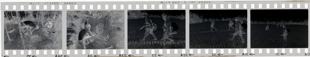 Untitled (Soldiers Walking Through Rice Paddy; Taking Break In Clearing, Vietnam)
