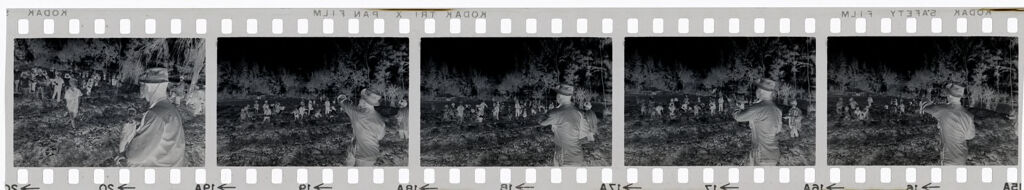 Untitled (Soldier And Group Of Children Playing In Field, Vietnam)