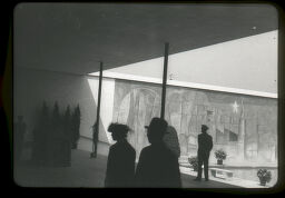 [Figures In Front Of Lyonel Feininger's Murals For The New York World's Fair, 1938]