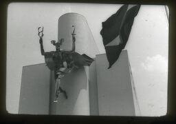 [Figural Sculpture And Flag, New York World's Fair, 1938]