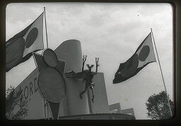 [Figural Sculpture And Flags, New York World's Fair, 1938]