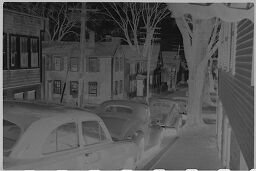 [Narrow Street With Cars Parked, New England]