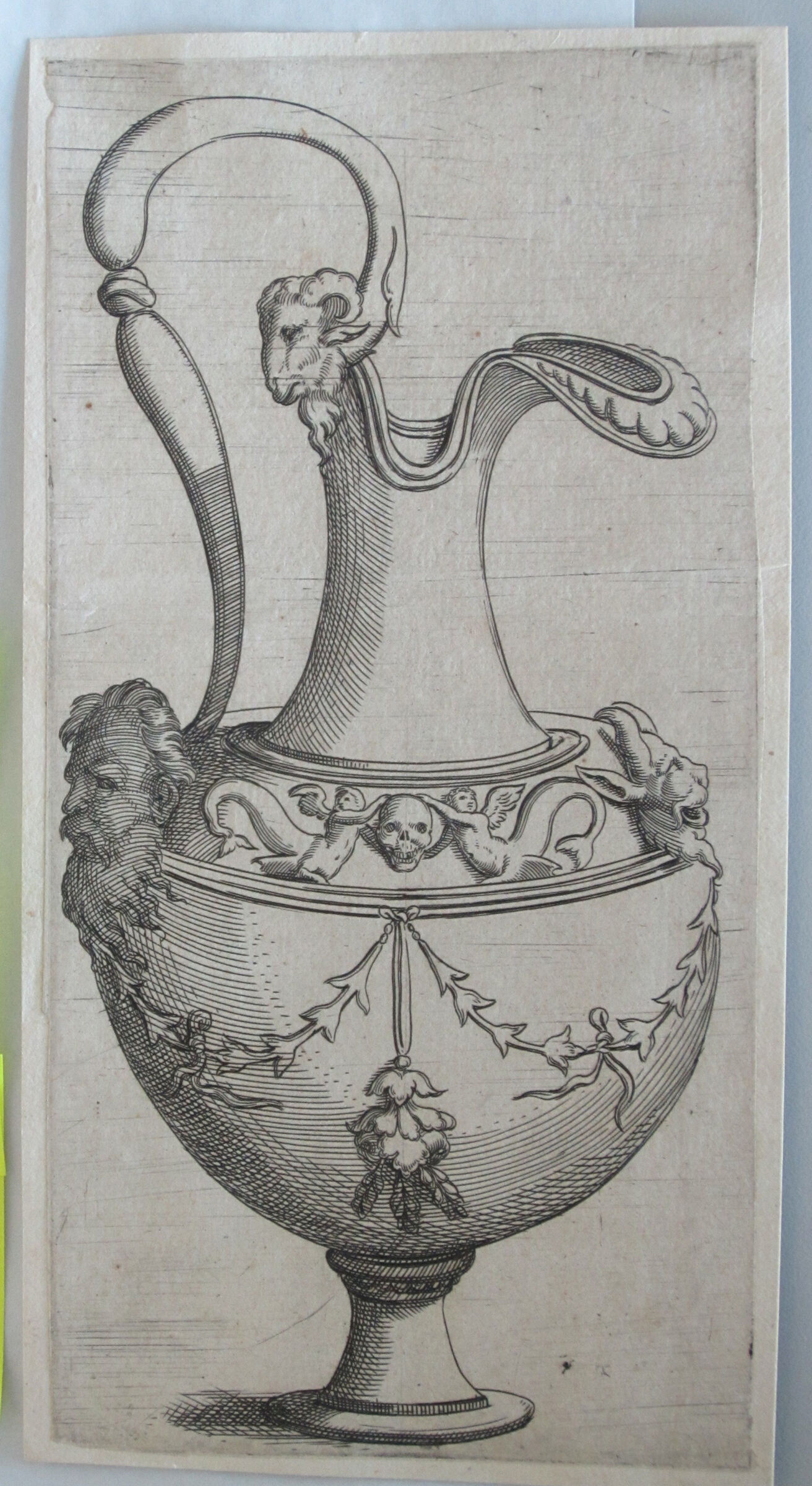 Ewer With Winged Putti With Fish Tails Holding A Skull, A Ram's Head On The Handle