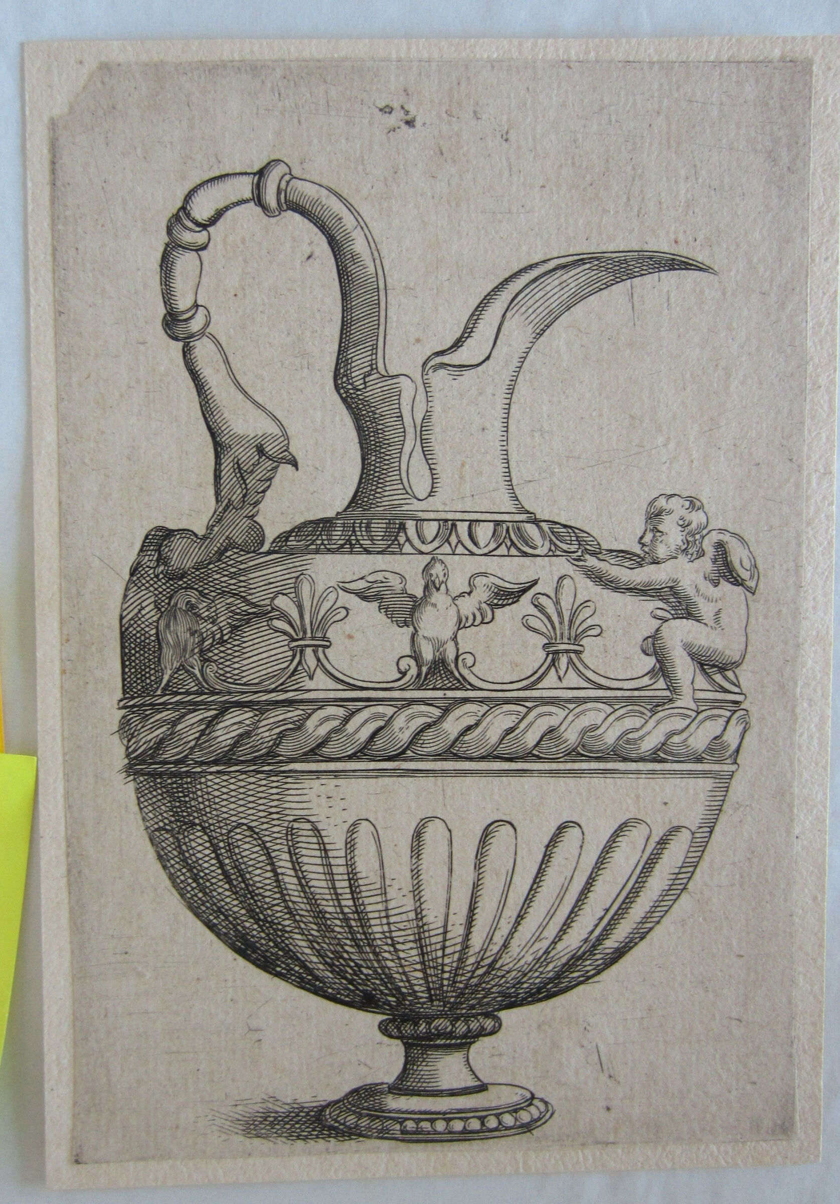 Ewer With A Winged Putto Grasping The Edge Of An Egg And Dart Border